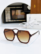 Tortoiseshell square sunglasses with amber lenses and gold hinge detail.