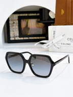 Black square sunglasses with dark lenses and gold hinge detail.