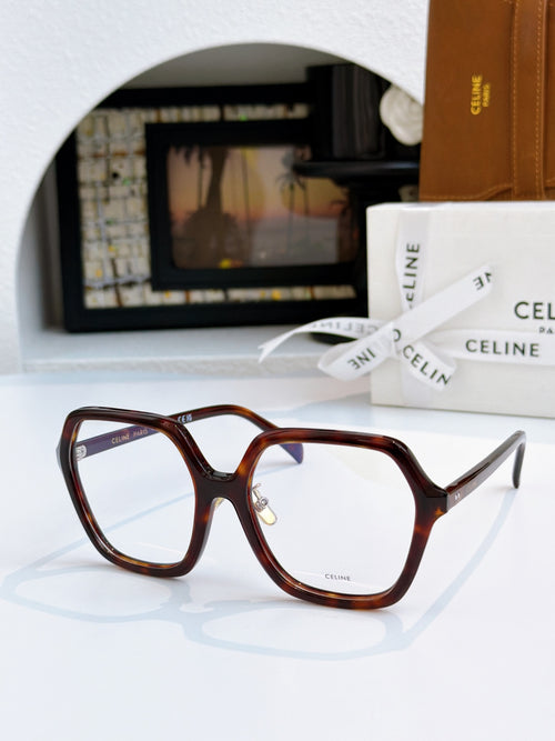 Tortoiseshell square eyeglass frames with gold hinge detail, clear lenses.