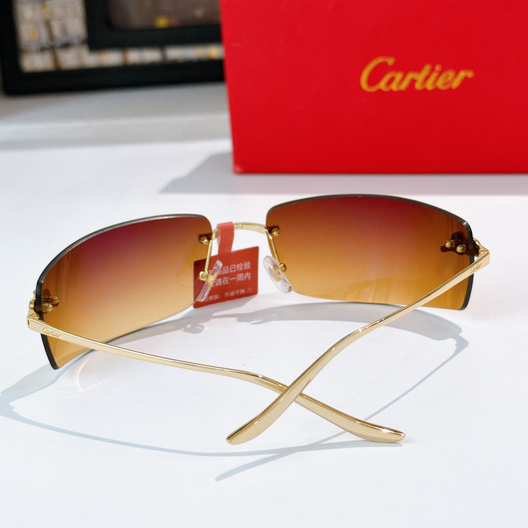 Cartier sunglasses with gold frame and amber tinted lenses, front view