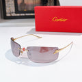 Cartier sunglasses with gold frame and gray-purple tinted lenses