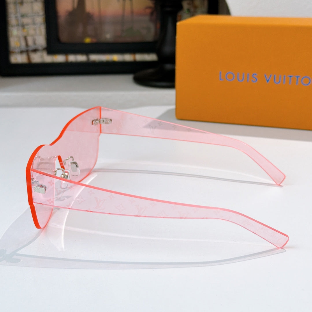 Louis Vuitton translucent pink monogram sunglasses with pink lenses and gold-tone hardware.