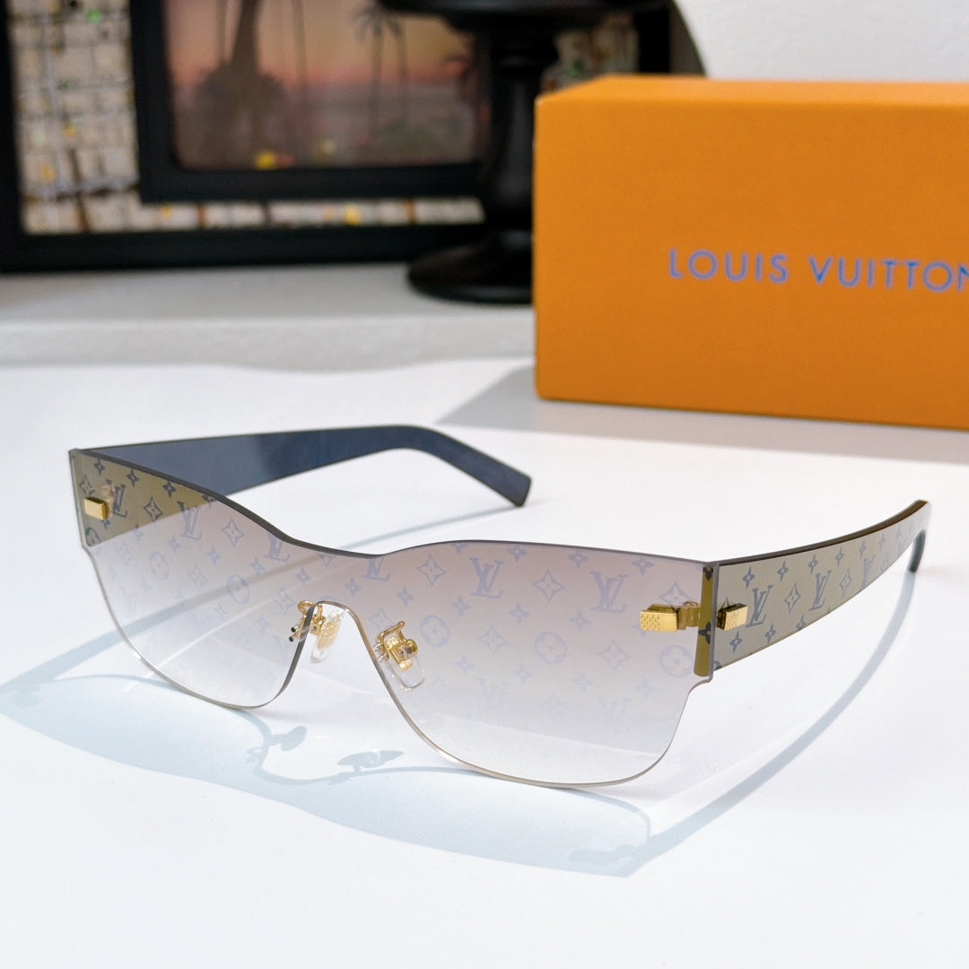Louis Vuitton monogram sunglasses with beige-and-navy patterned frames and gold-tone temples.