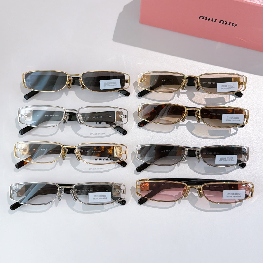 Assorted designer sunglasses and eyeglasses with gold and silver frames, various lens tints