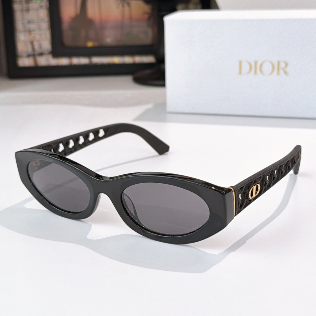 Dior cat-eye sunglasses with black frame and dark gray tinted lenses
