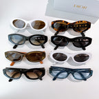 Assorted Dior cat-eye sunglasses display with mixed frame colors and tinted lenses