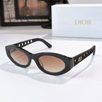 Dior cat-eye sunglasses with black frame and rose-brown tinted lenses