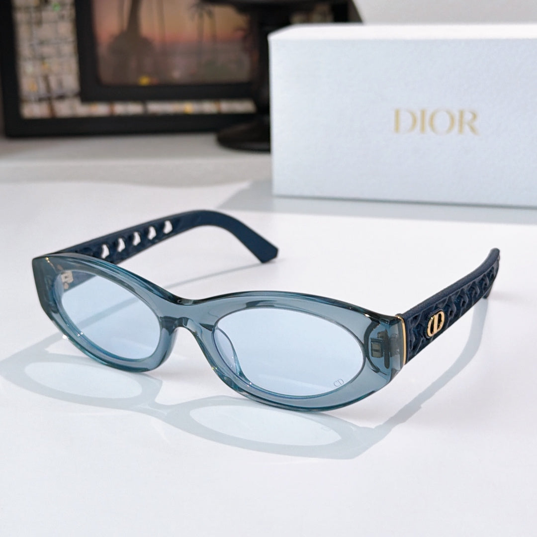 Dior cat-eye sunglasses with blue frame and light blue tinted lenses