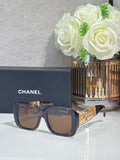 Chanel sunglasses with navy frame and brown square lenses