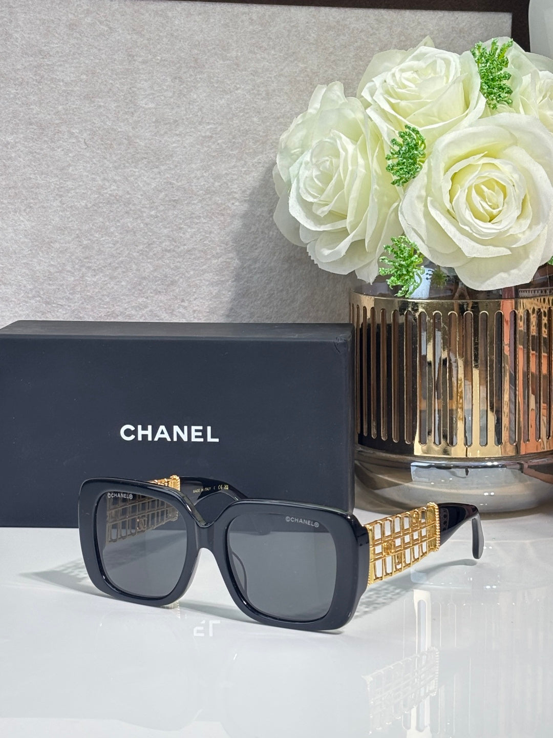 Chanel sunglasses with dark blue frame and dark lenses