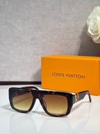 Tortoiseshell square sunglasses with tinted lenses and gold-tone hinge detail
