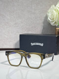 Chrome glasses with dark green rectangular frames and gold-tone temple details