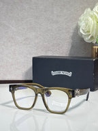 Chrome glasses with dark green rectangular frames and gold-tone temple details