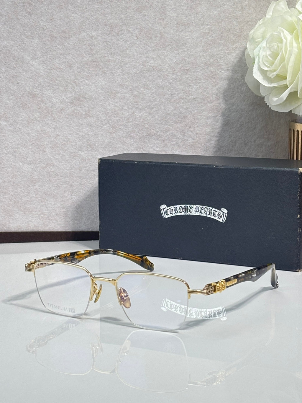 Gold-tone eyeglasses with clear lenses and translucent yellow temple arms