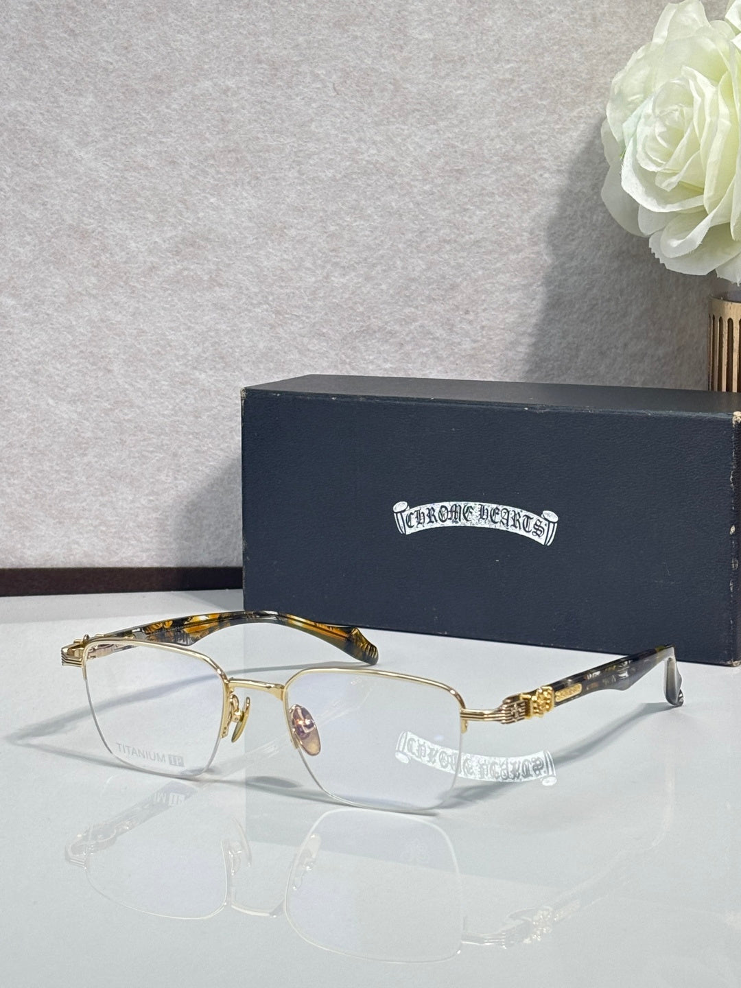 Gold-tone eyeglasses with clear lenses and translucent yellow temple arms