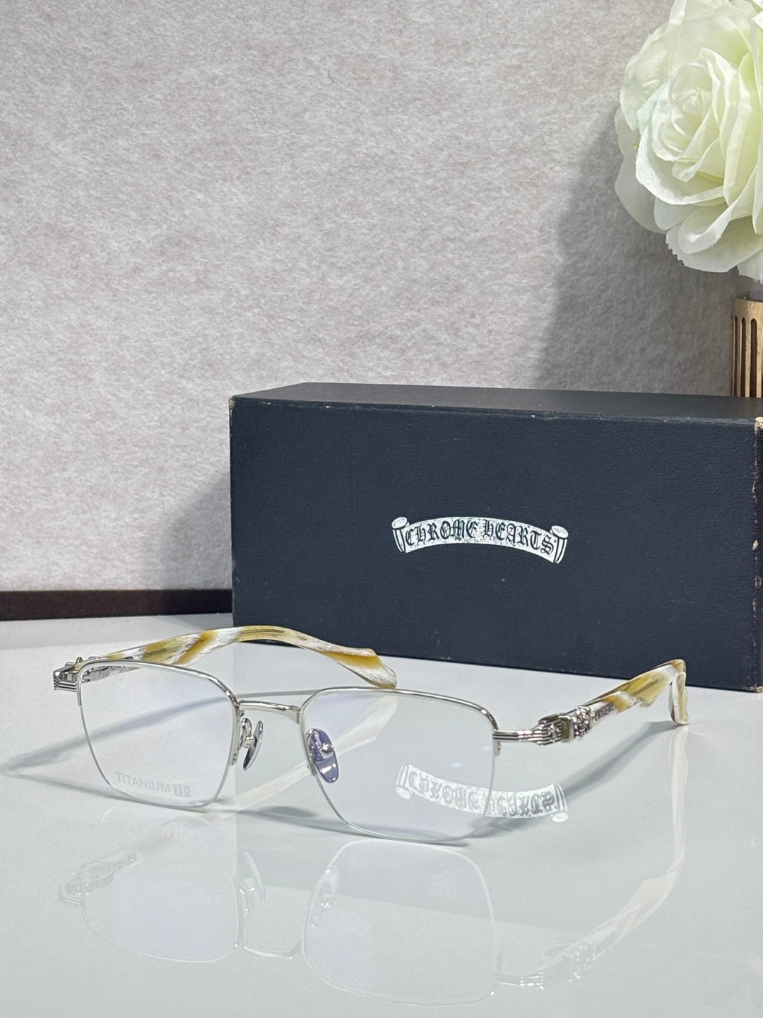 Gold-tone eyeglasses with clear lenses and translucent yellow temples