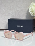 Chanel sunglasses with light pink frames and pale pink tinted lenses