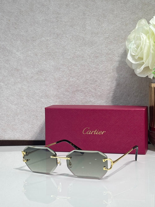 Cartier sunglasses with dark green tinted lenses and gold-tone metal frames