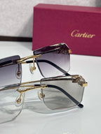 Gold-tone rectangular eyeglasses with purple tinted lenses and black temple accents