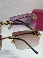 Purple-tinted rectangular eyeglasses with gold-tone rims and black temple tips