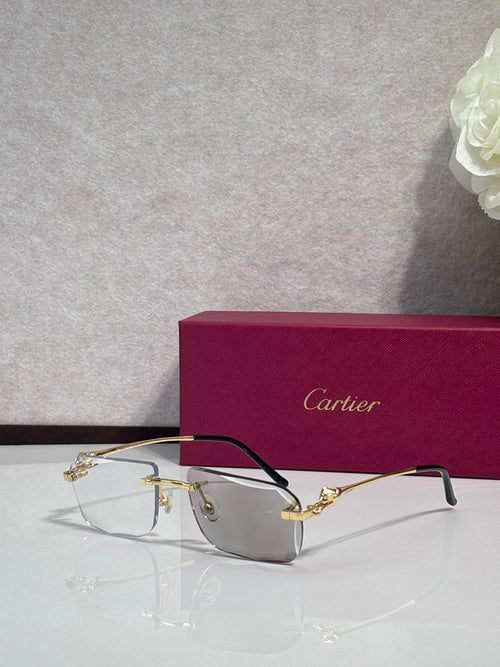Cartier gold-tone rectangular eyeglasses with clear gray lenses and dark temples