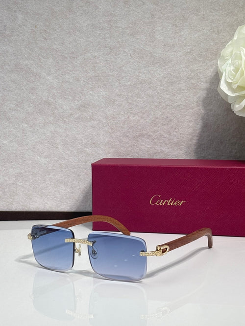 Gold-tone eyeglasses with blue lenses, clear front, and wood-style temples