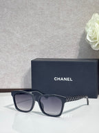 Black square sunglasses with textured temple, dark gradient lenses, low-profile logo