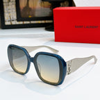 YSL sunglasses with blue frames and dark blue tinted lenses, gold logo detail on temples.