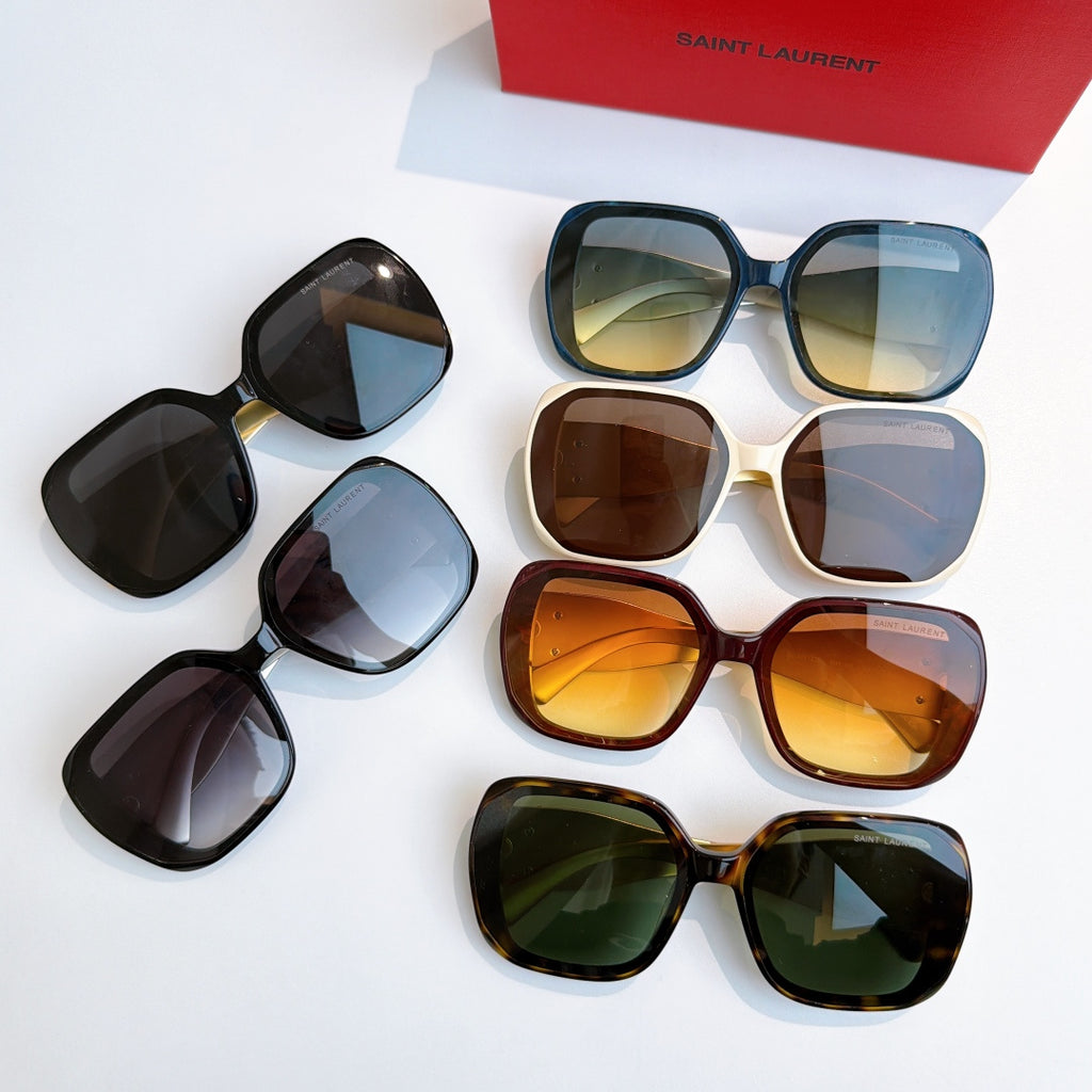 YSL sunglasses assortment with black, blue, brown, tortoiseshell, and cream frames.