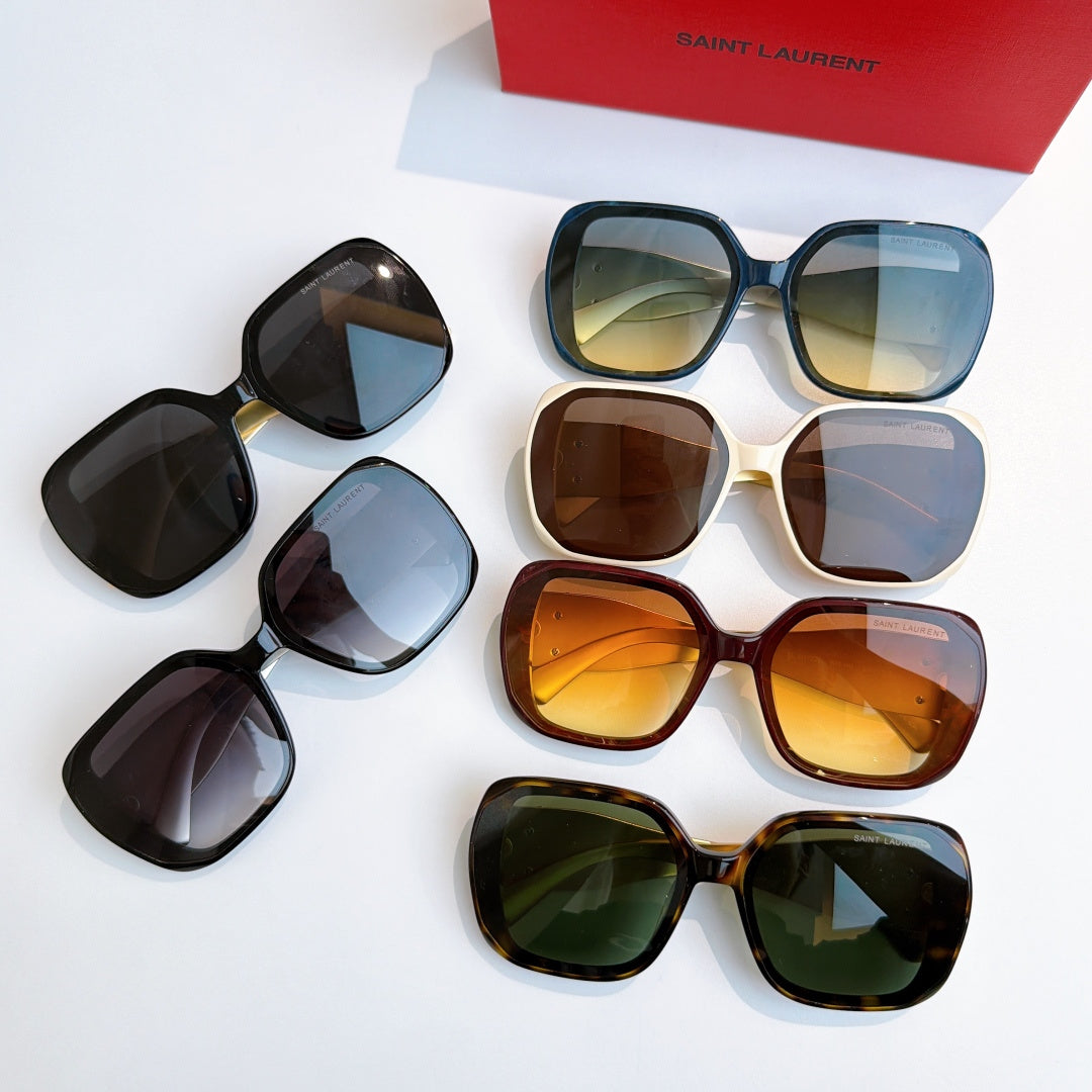 YSL sunglasses assortment with black, blue, brown, tortoiseshell, and cream frames.