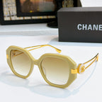 Chanel sunglasses with cream frames and light tinted lenses