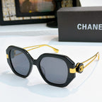 Chanel sunglasses with dark frames and gray tinted lenses