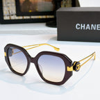 Chanel sunglasses with dark brown frames and tinted lenses