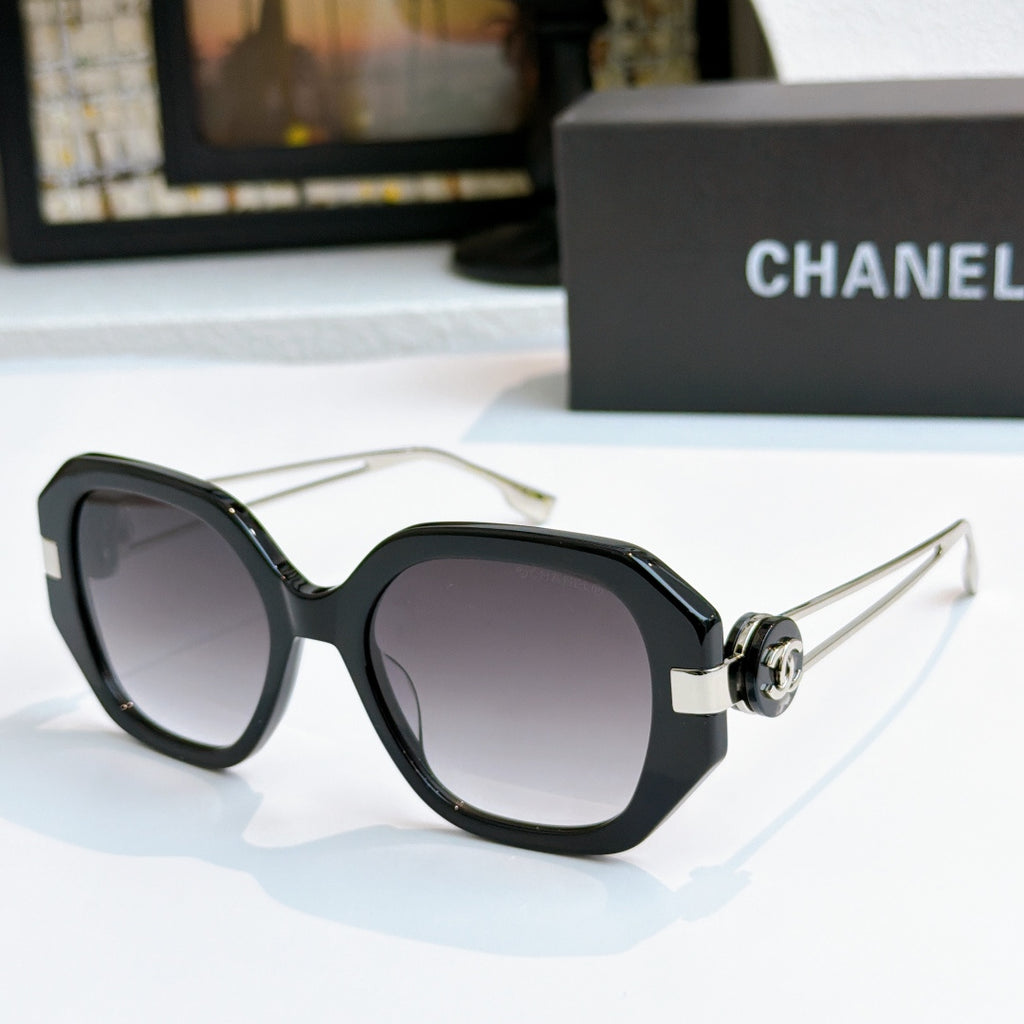 Chanel sunglasses with black frames and dark square lenses