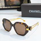 Chanel sunglasses with tortoiseshell frames, brown lenses, and gold-tone arms