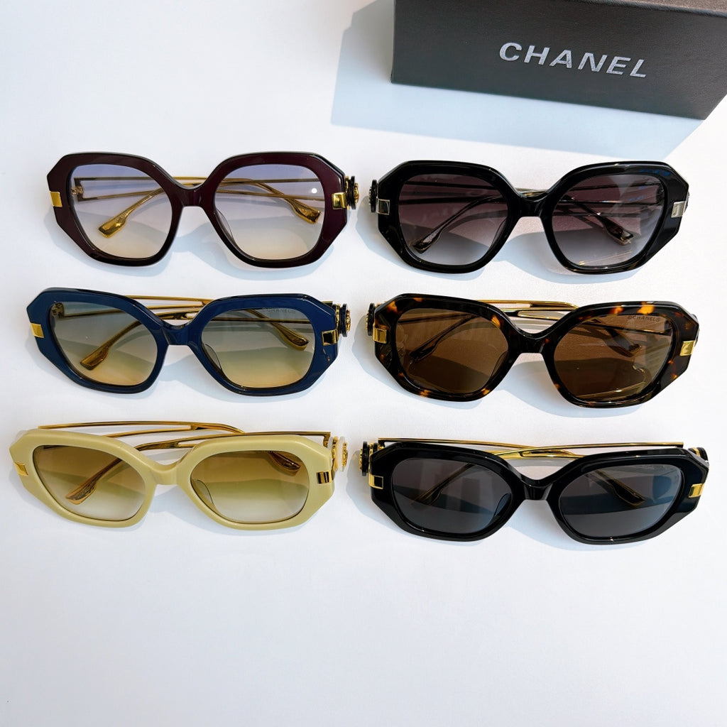 Chanel sunglasses display with multiple frame colors and tinted lenses