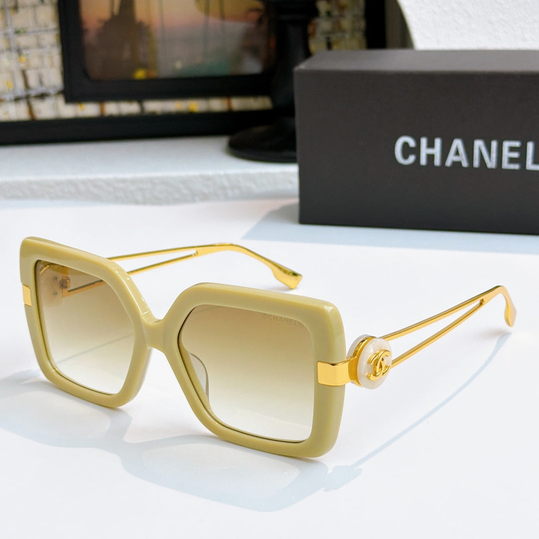 Square sunglasses with cream frames and gold-tone logo arms