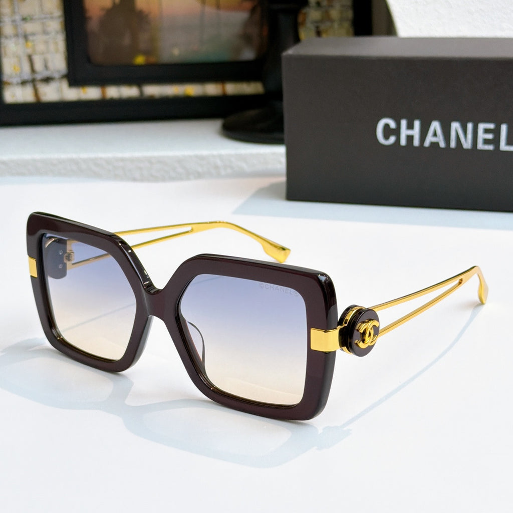 Square sunglasses with dark tortoise frames and gold-tone logo arms