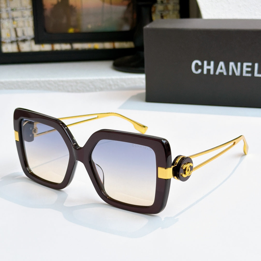 Square sunglasses with dark tortoise frames and gold-tone logo arms