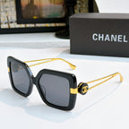 Square sunglasses with black frames and gold-tone logo arms