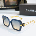Square sunglasses with dark blue frames and gold-tone logo arms