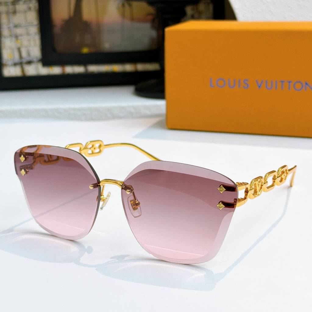 Louis Vuitton cat-eye sunglasses with pink gradient lenses and gold-tone frame