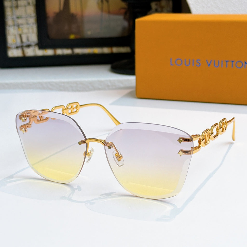 Louis Vuitton cat-eye sunglasses with gold frame and pale yellow gradient lenses