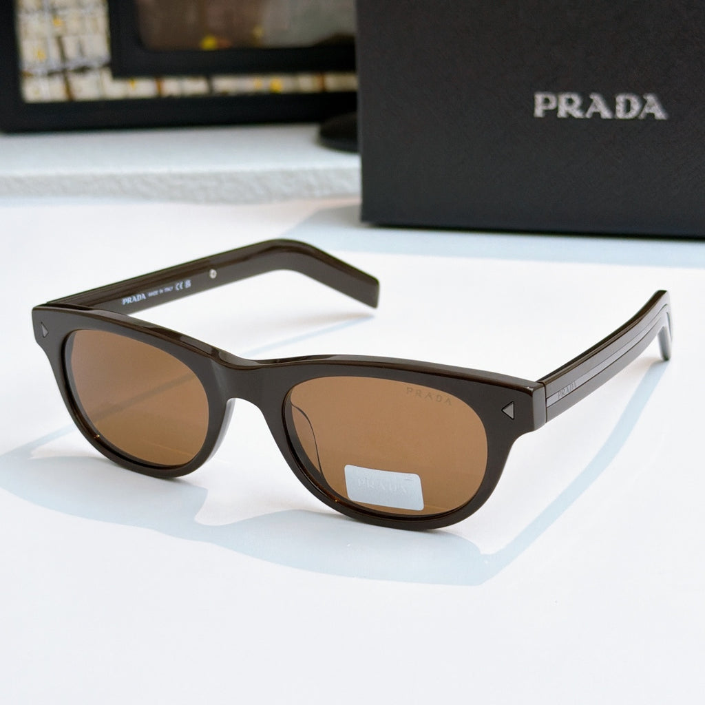 Prada sunglasses with dark frames and brown lenses, logo on side temple