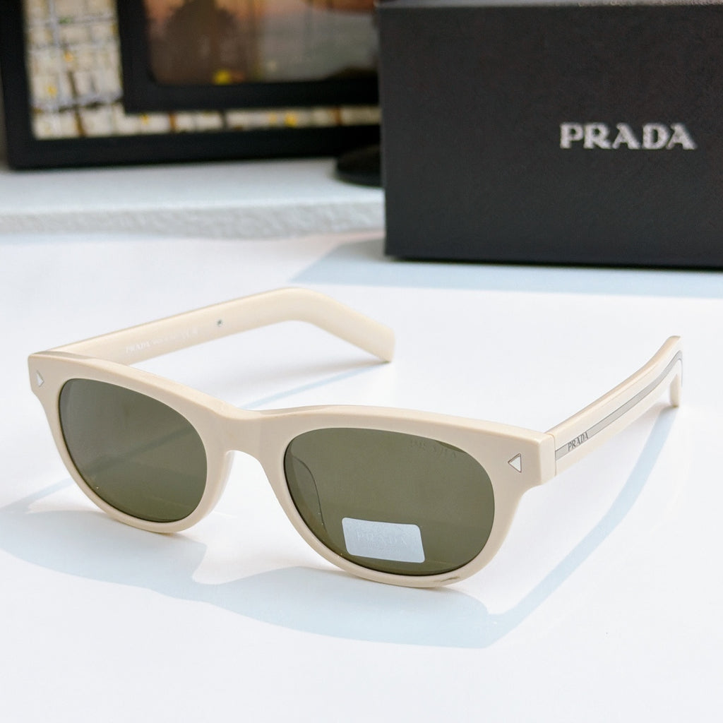 Prada sunglasses with white frames and dark green lenses, logo on temple