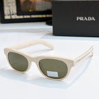 Prada sunglasses with white frames and dark green lenses, logo on temple