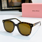 MiuMiu tortoise cat-eye sunglasses with amber lenses and gold-tone hinges