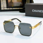 Chanel square sunglasses with gold frame and blue tinted lenses