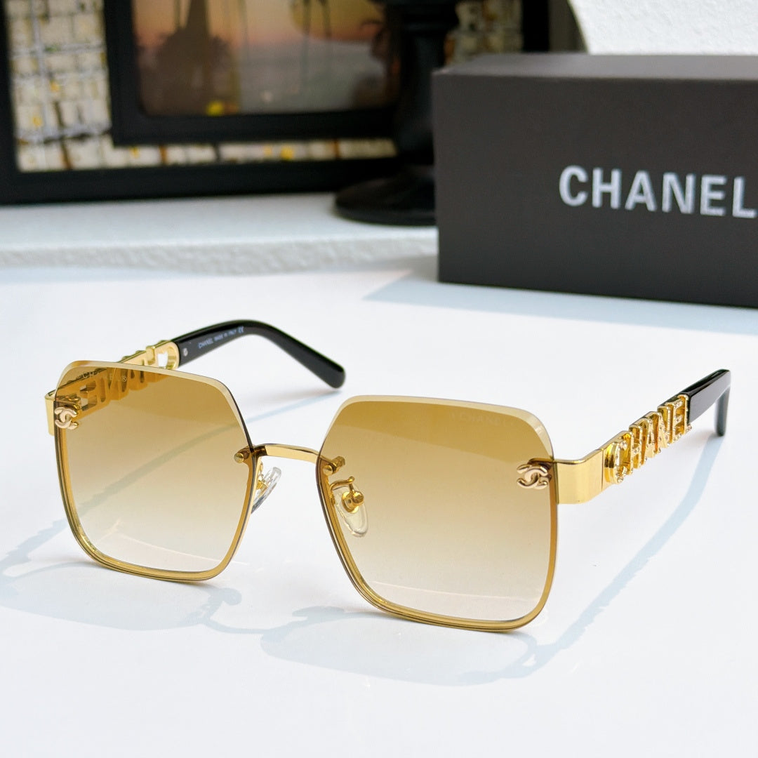 Chanel square sunglasses with gold frame and light amber tinted lenses