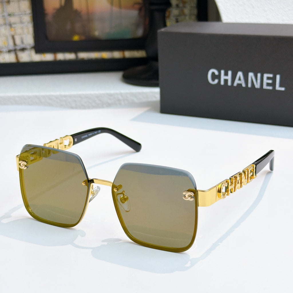 Chanel square sunglasses with gold frame and dark green tinted lenses
